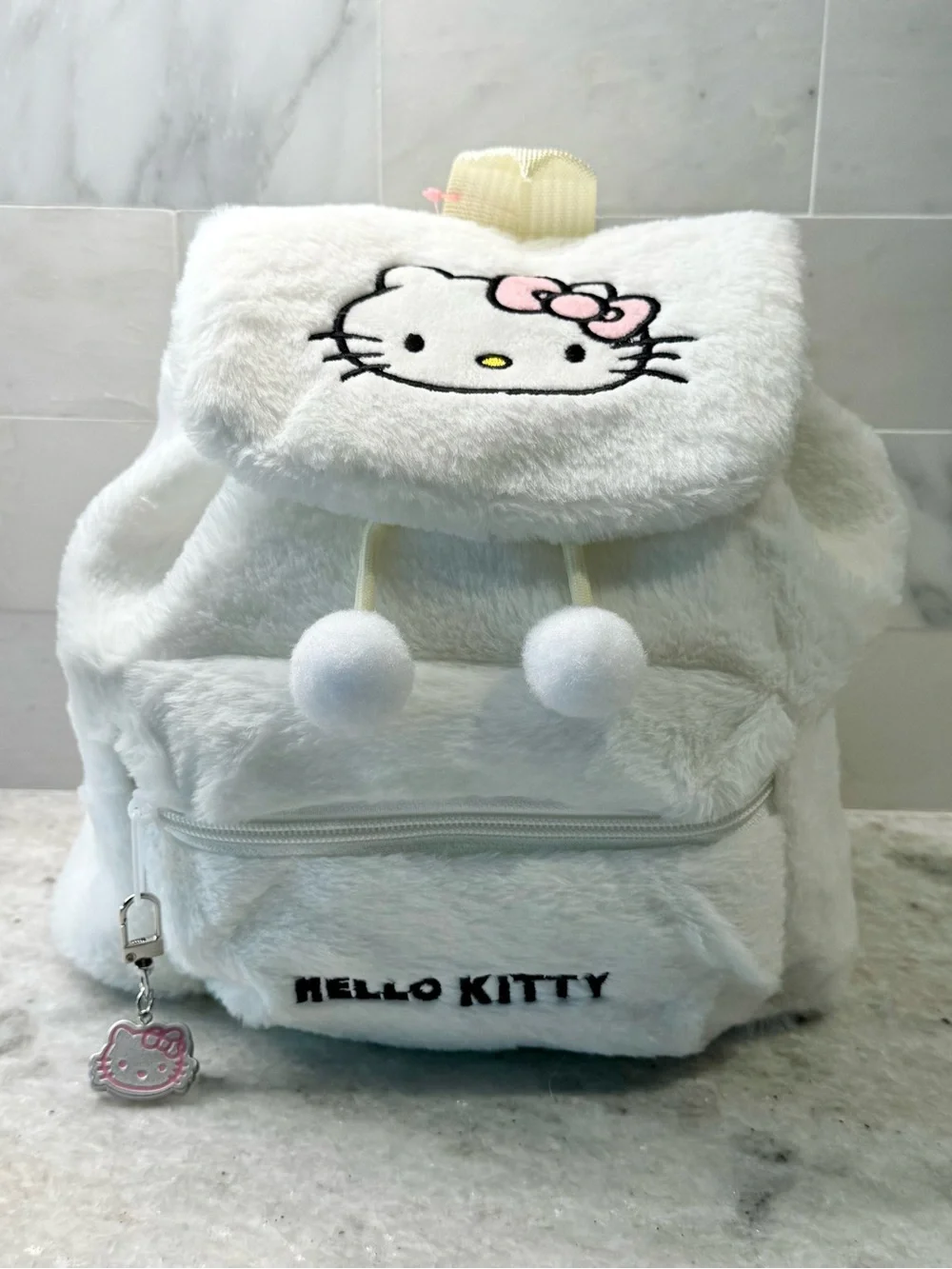 New Women’s Hello Kitty Embroidered White Faux Fur Mini Backpack Purse w/ Charm